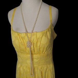 long faux pearls fun playful lots of different ways of wearing them